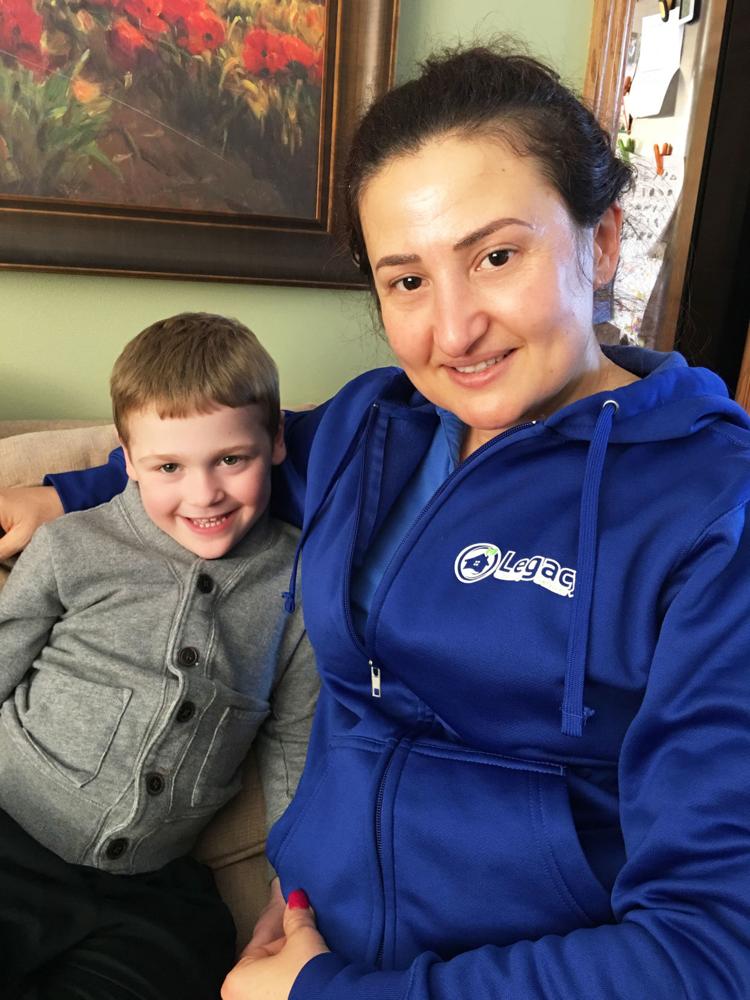Happy family relaxing in clean living room